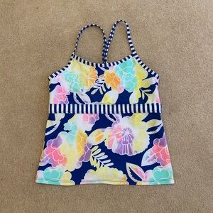 Girls swimming tankini and size L in girls/ for 11-13 year olds.